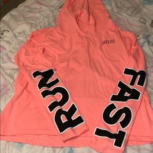 This is a justice neon pink long sleeve shirt